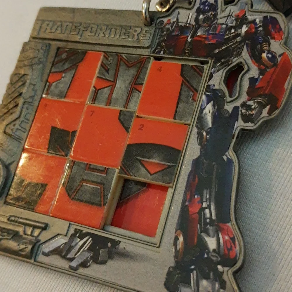 Transformers Miniature Slide Puzzle Keychain Autobot Symbol 2007